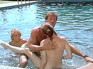 Nikki Charm joins her kinky friends for a shag in a swimming pool