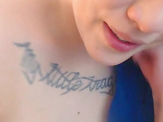 Closeup Squirt Blue Hair Punk Teen With Tattoos